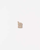 Toast Charm - Pavé on light color background.