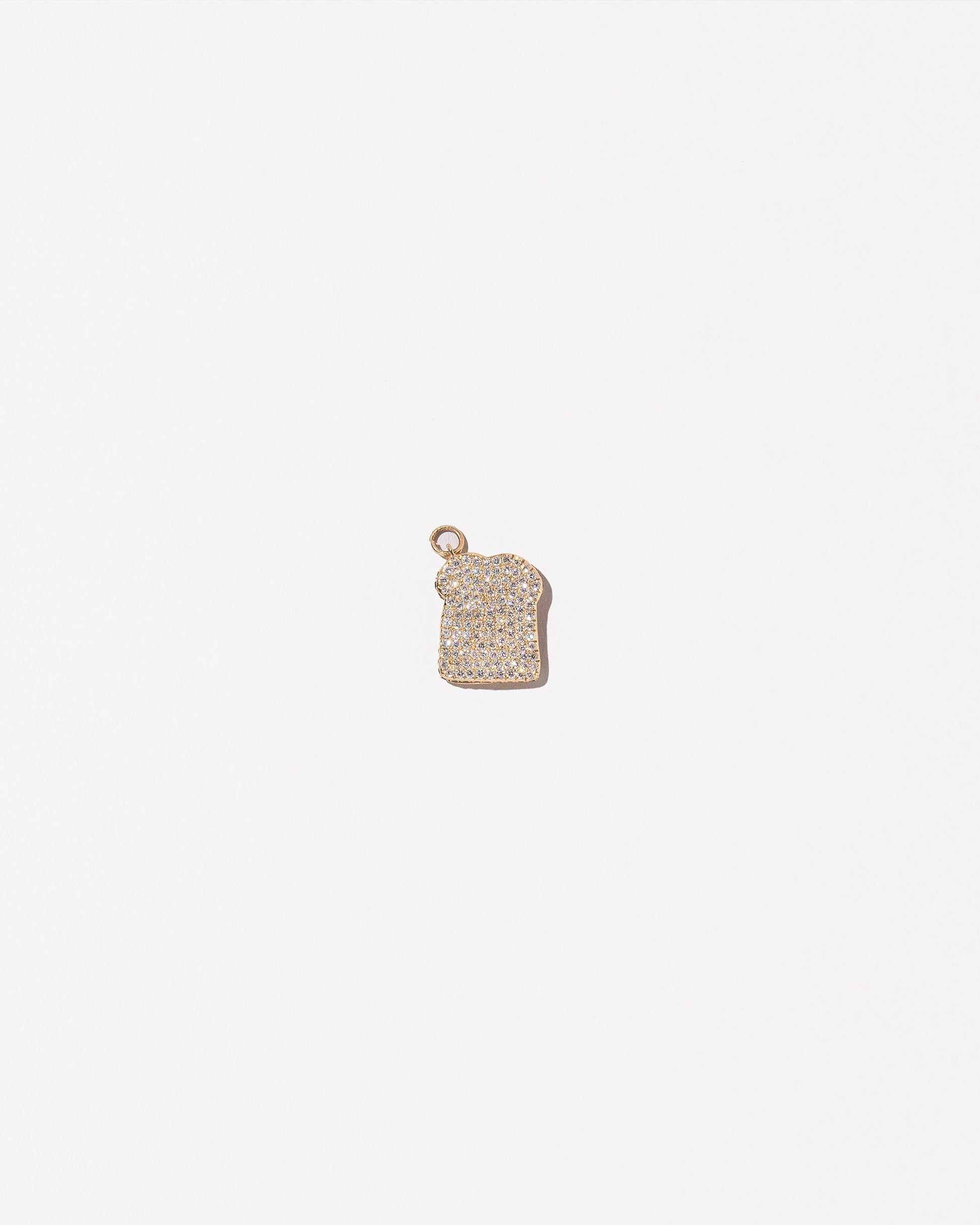Toast Charm - Pavé on light color background.