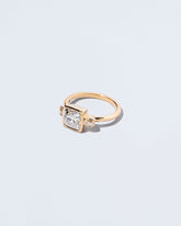 Genesis Ring on light color background.