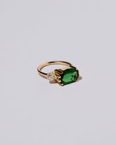 Product photo of the Golden Darura Ring on a light color background