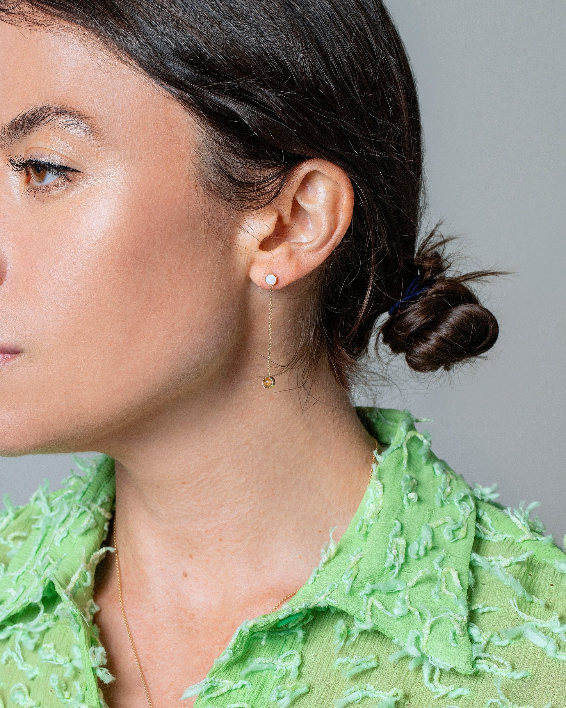 One-Drop Birthstone Earring Single on model.