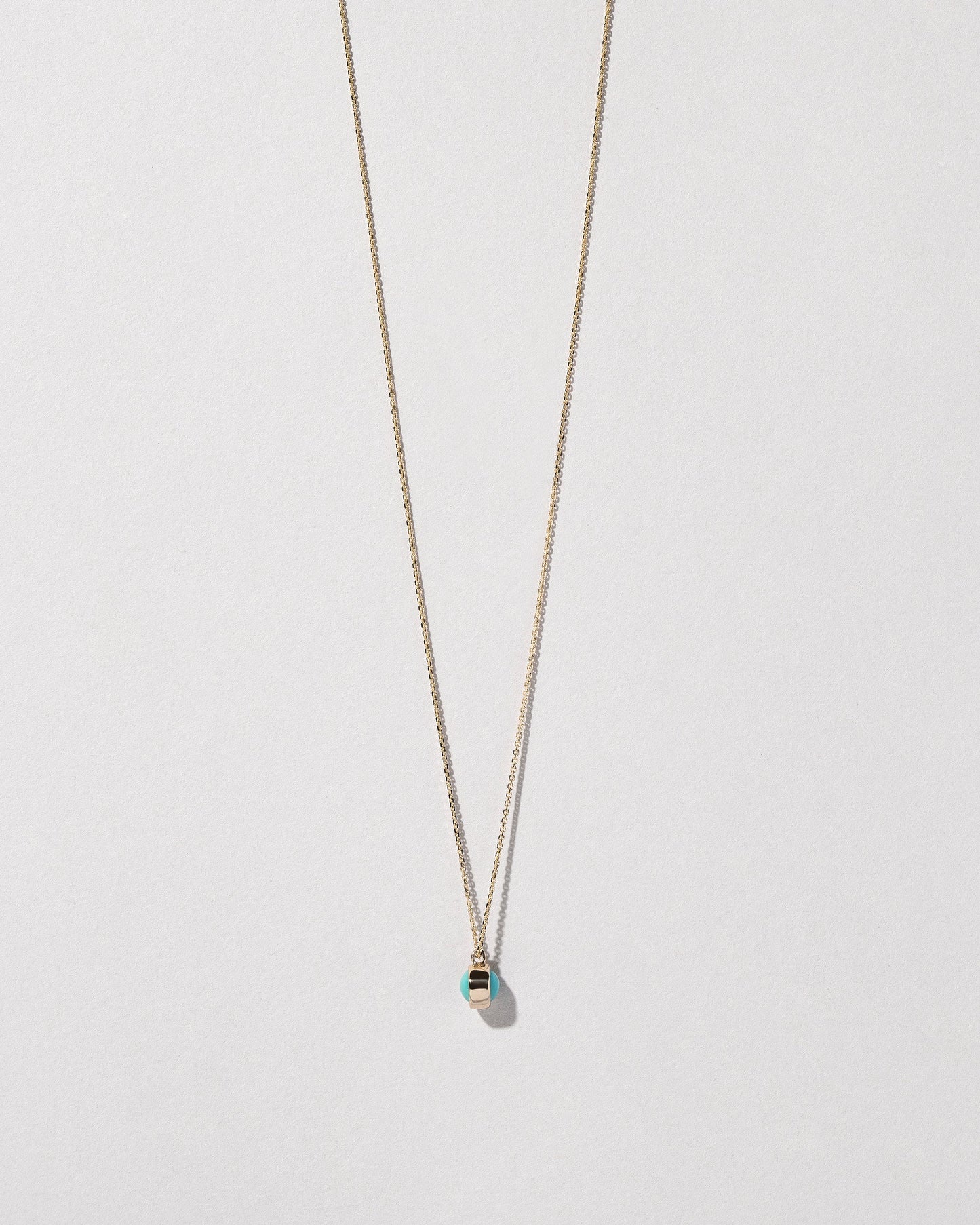 Birthstone Necklace on light color background.