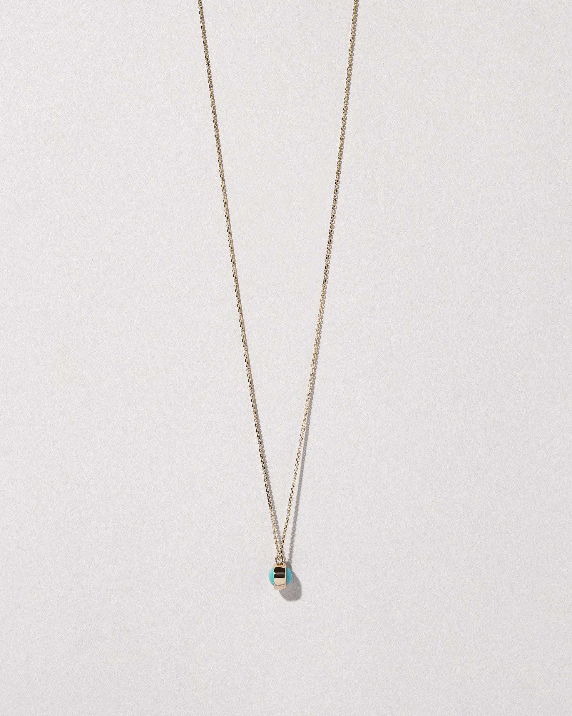 Birthstone Necklace on light color background.