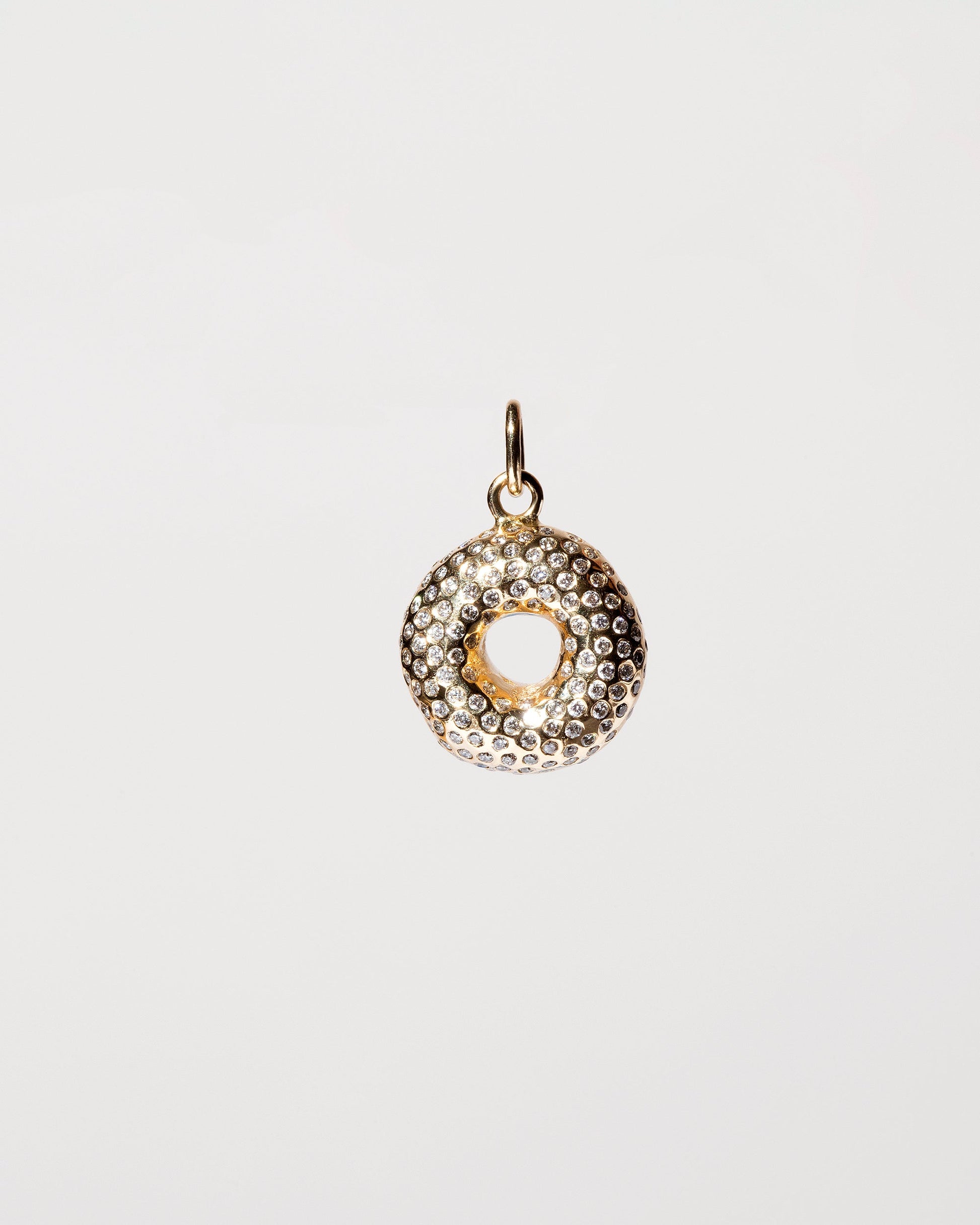 Sugar Donut Charm on light color background.