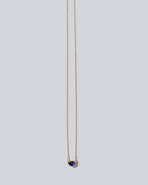 Reef Necklace on light colored background.