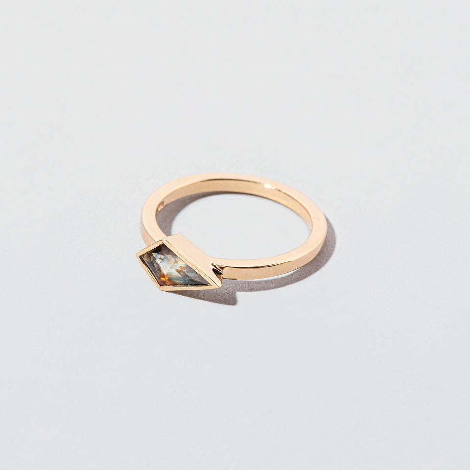 product_details::Closeup details of the Cristales Ring on light color background.