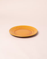 La Ceramica Vincenzo Del Monaco Caramel Yellow Medium Dish on light color background.