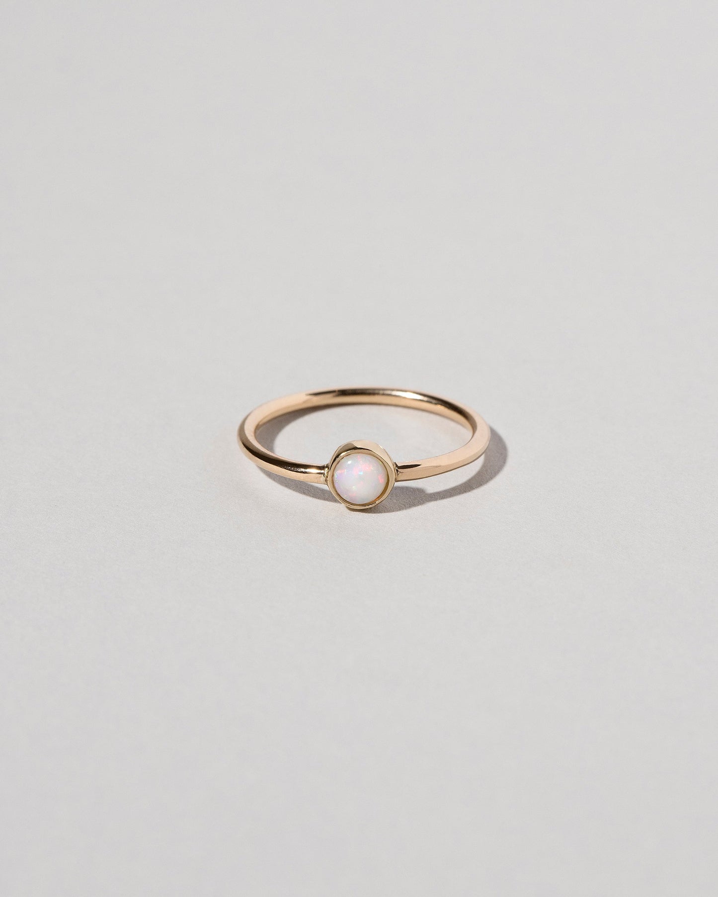 Birthstone Ring on light color background.