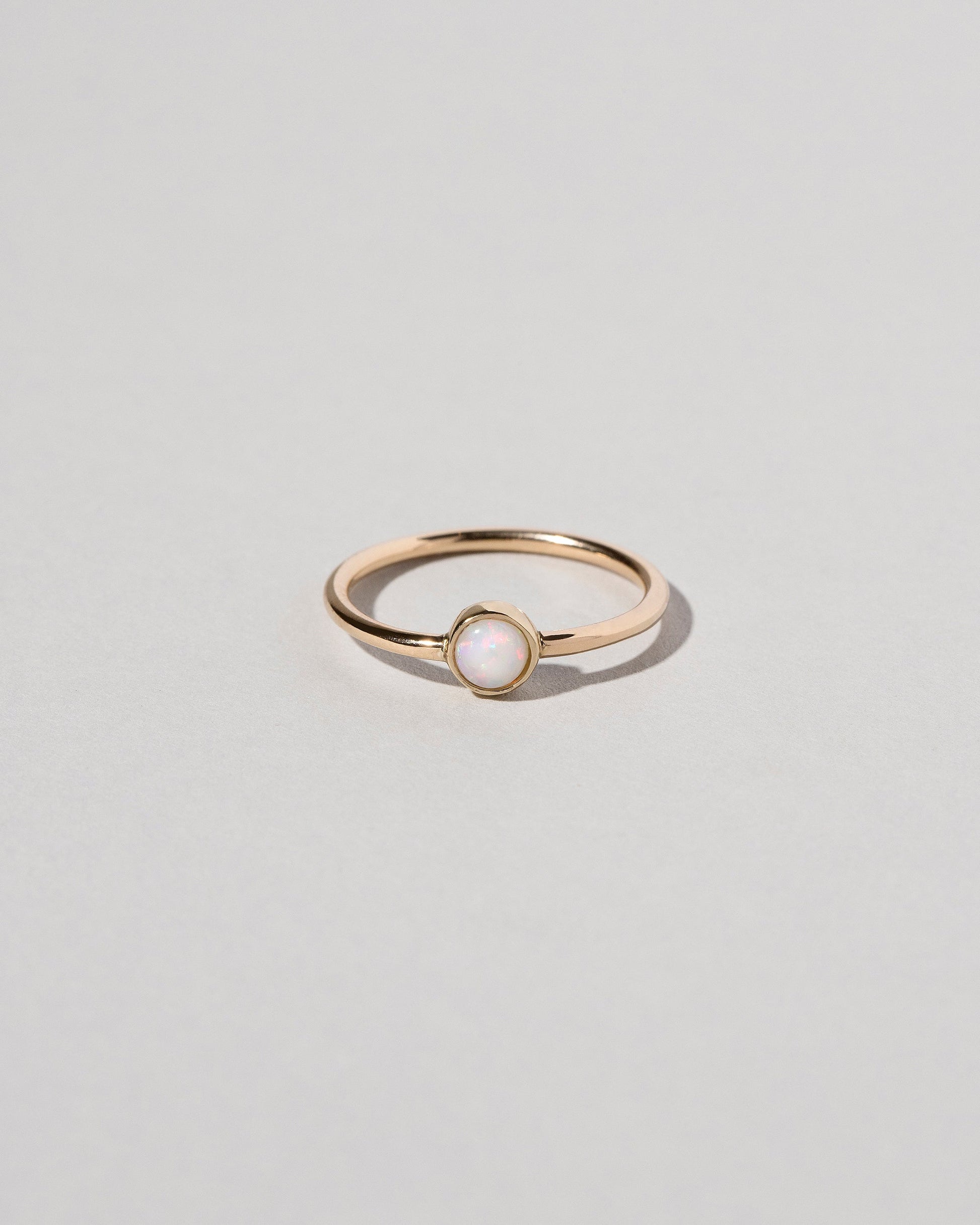 Birthstone Ring on light color background.