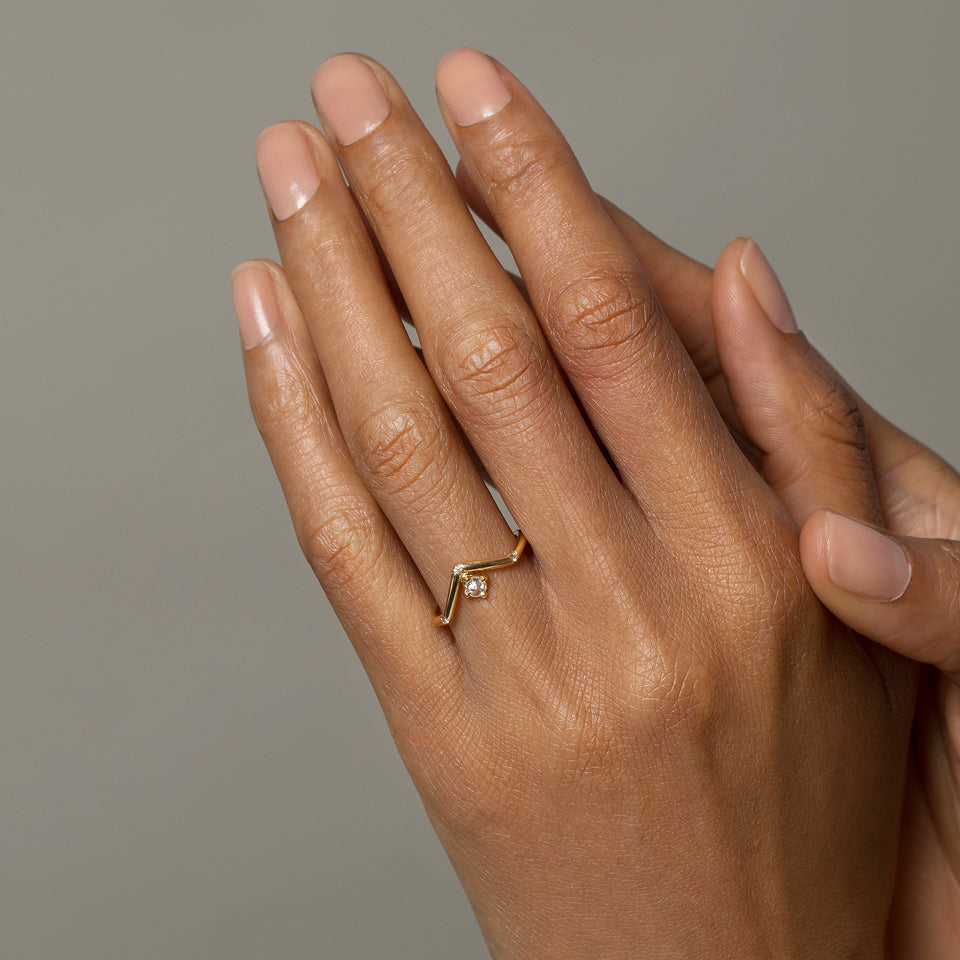 product_details::Mini Peak Ring on model.