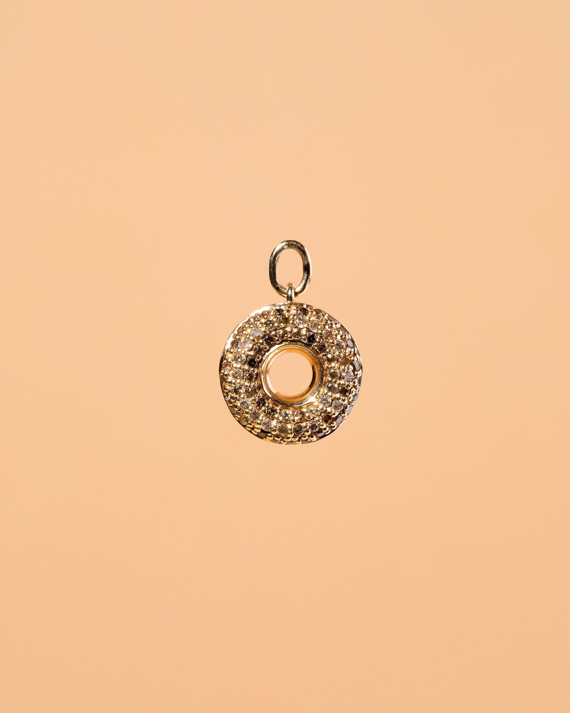 Chocolate Donut Charm on light color background.