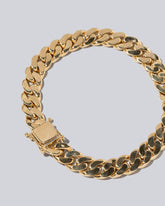 Curb Chain Bracelet on light colored background.