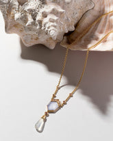 Blue Chalcedony Kite Necklace on light color background.