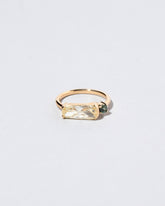 Immanence Ring on light color background.