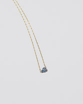 Say Yes Necklace on light color background.