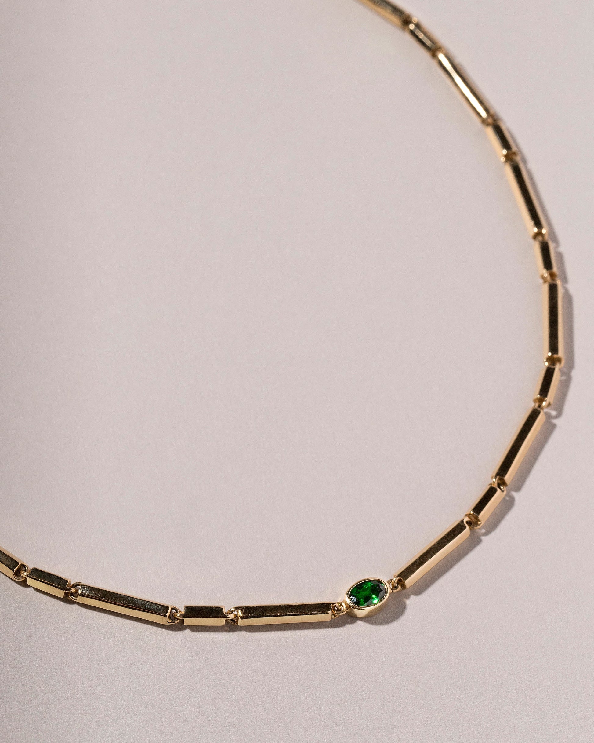 Kinetic Necklace - Made to Order on light color background.
