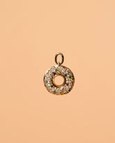 Strawberry Sprinkle Donut Charm on light color background.