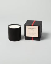 Good Medicine Candle on light color background.