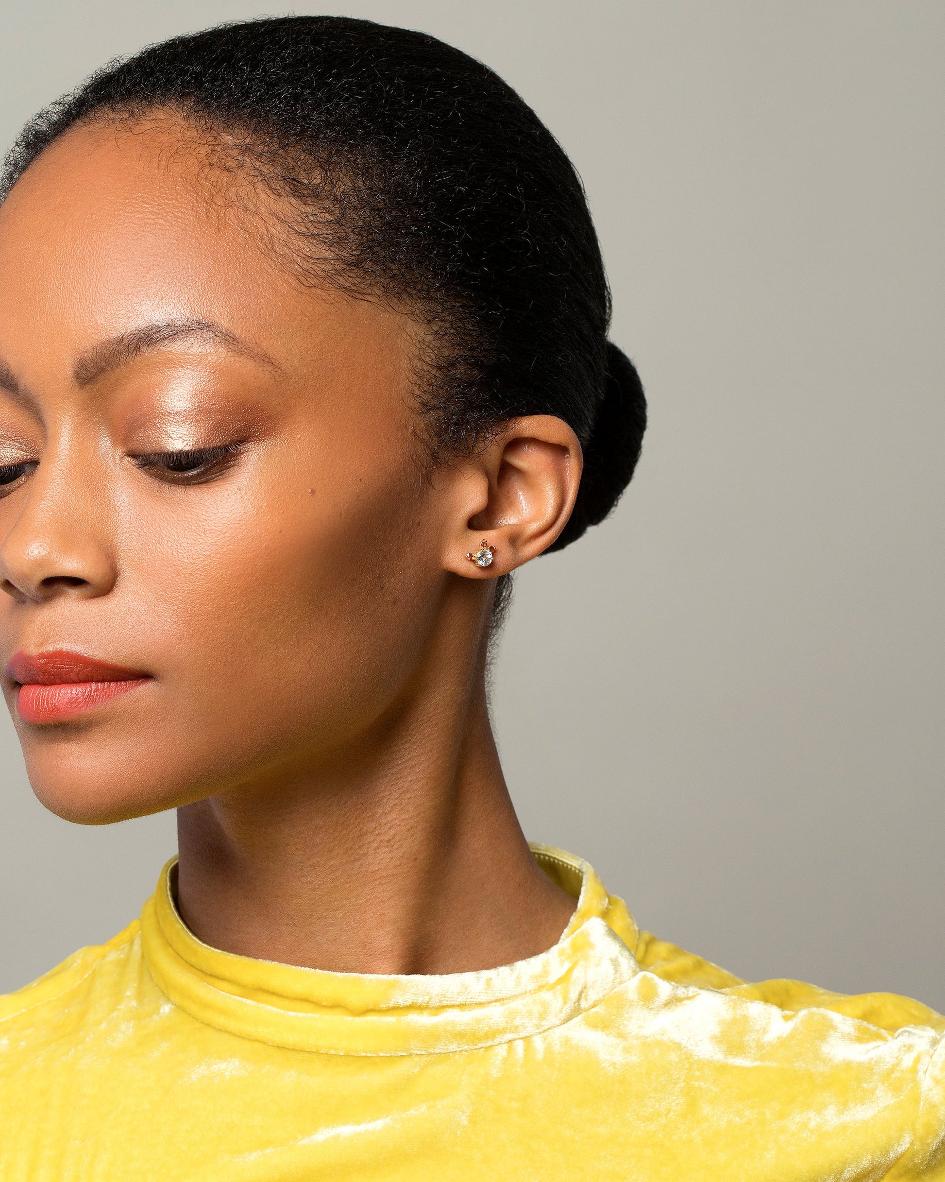 Aquamarine & Garnet Earrings on model.