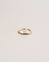 Stacked Ring - White & Black Diamond on light color background.