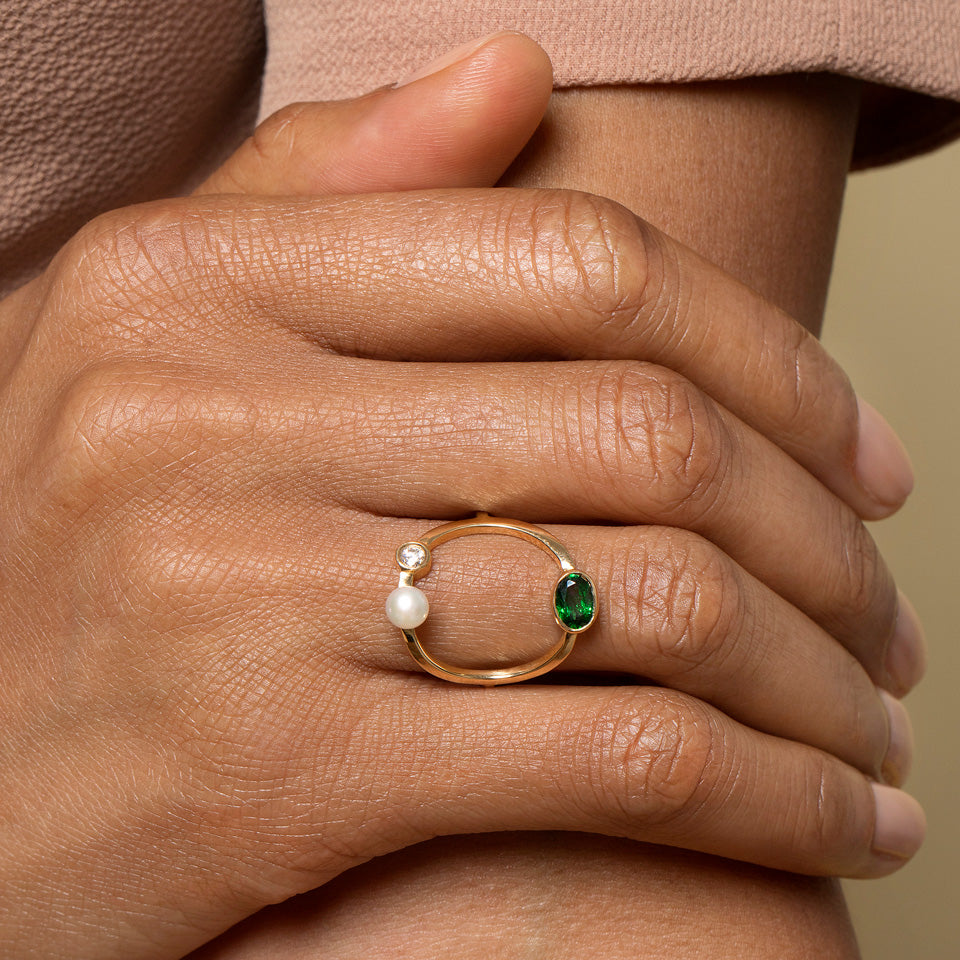 product_details::Trilogy Ring - Tsavorite on model.