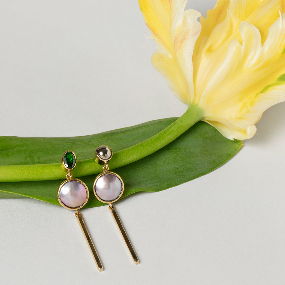 product_details:: Act 2. Earrings 5 on light color background.