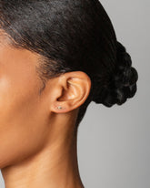 Left Eye Stud Earring Single on model.