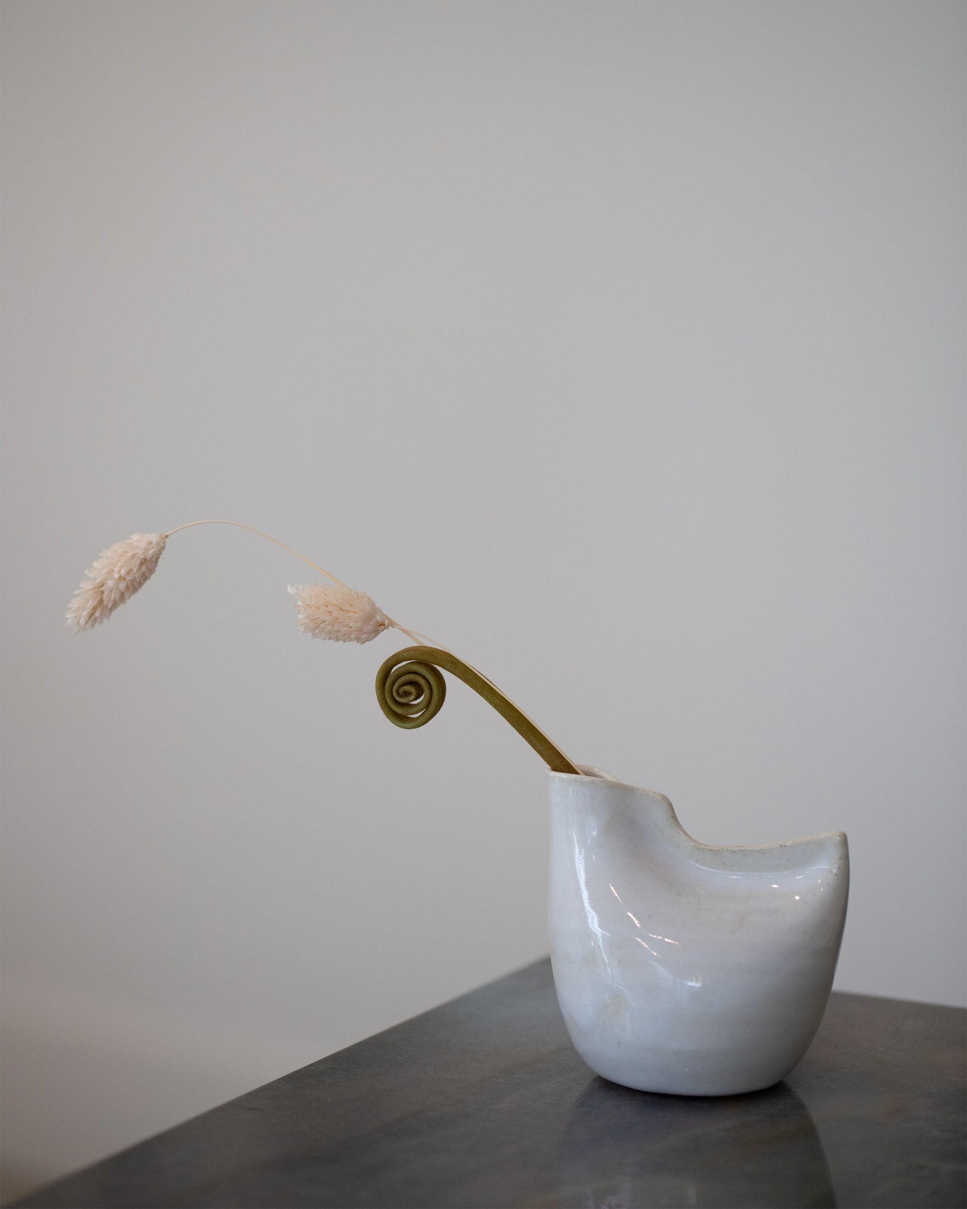 Styled image featuring Eric Bonnin Off-White Small Bird Vase.