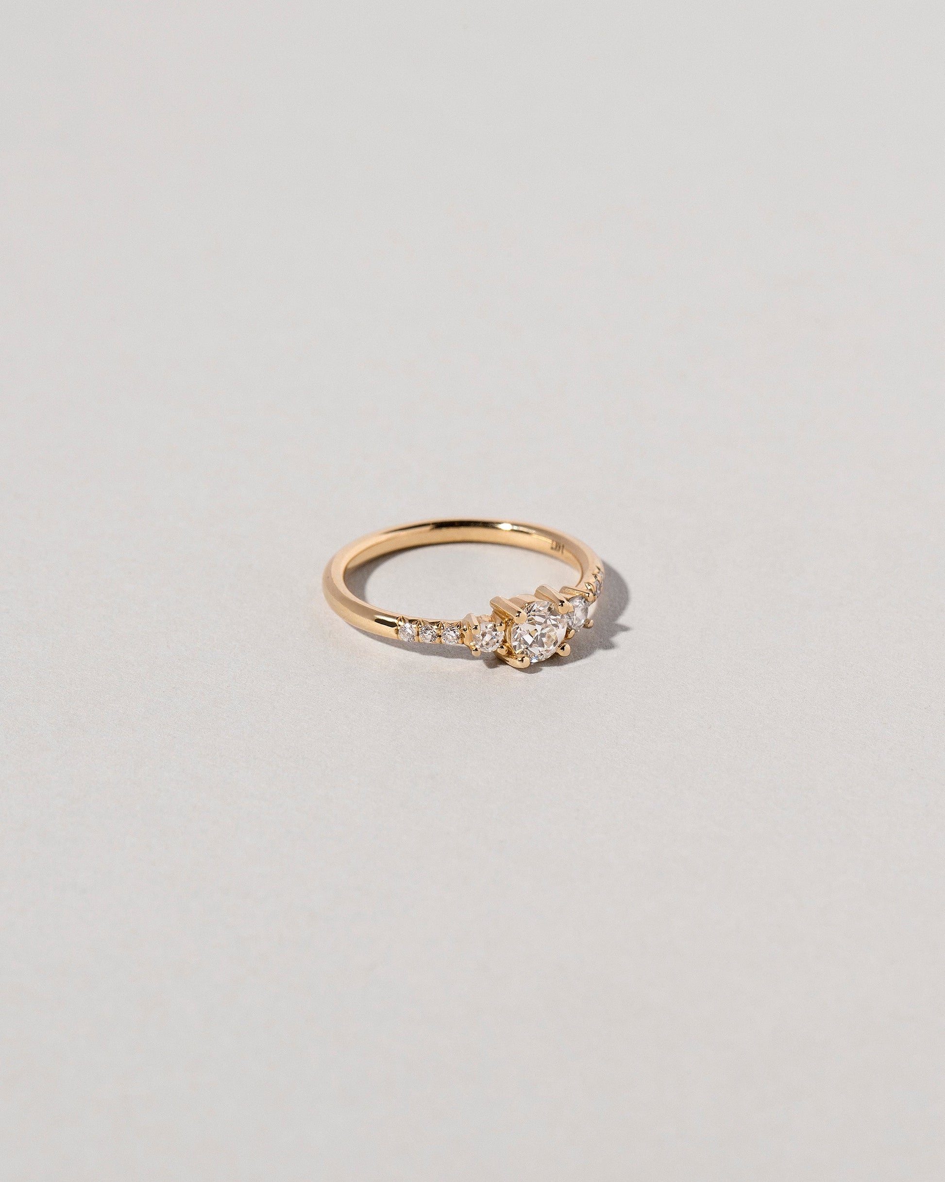 Patira Ring - White Diamond on light color background.
