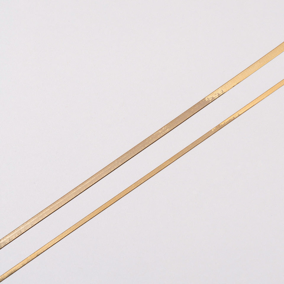 product_details::Liquid Chain Necklace on light color background.
