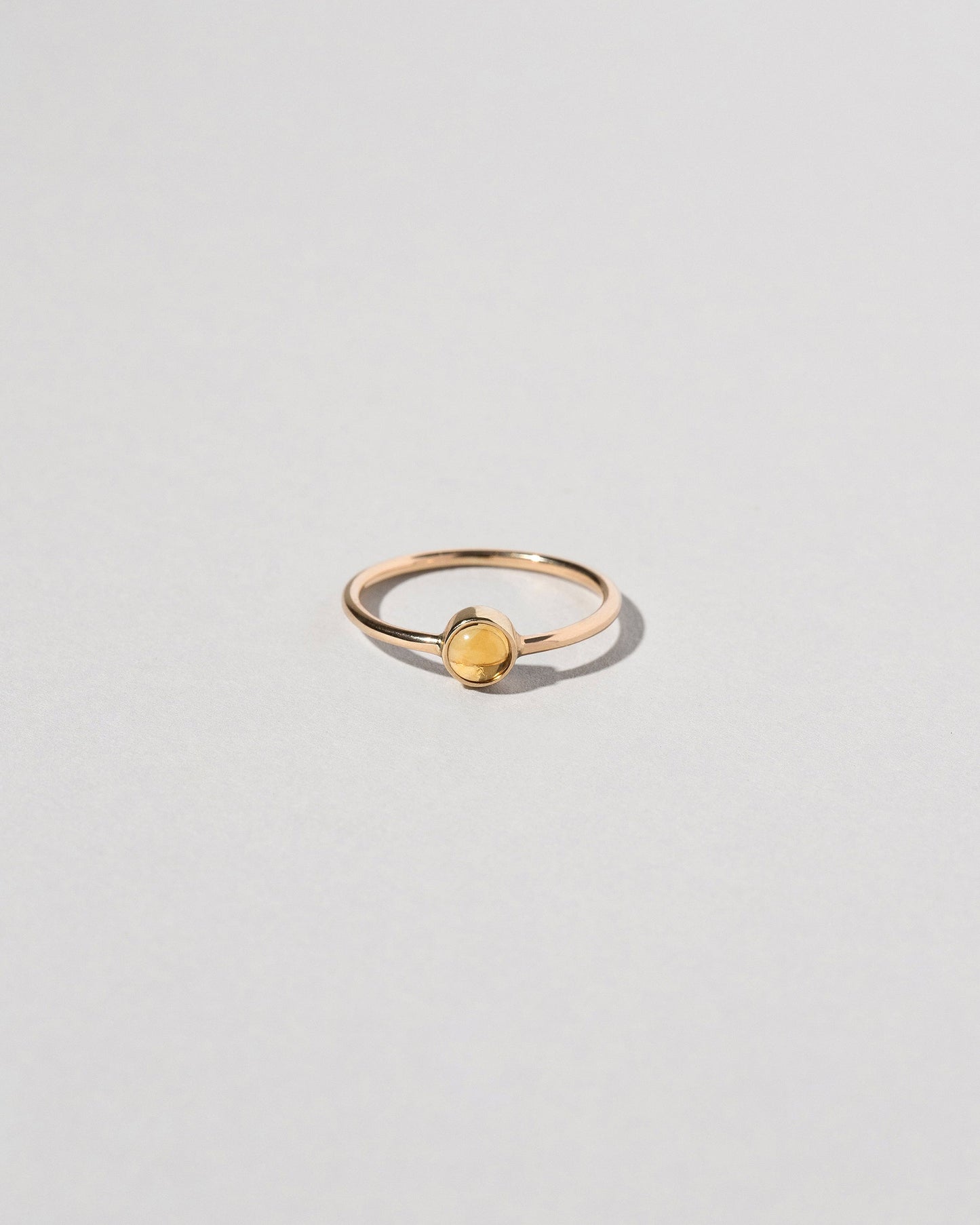 Birthstone Ring on light color background.