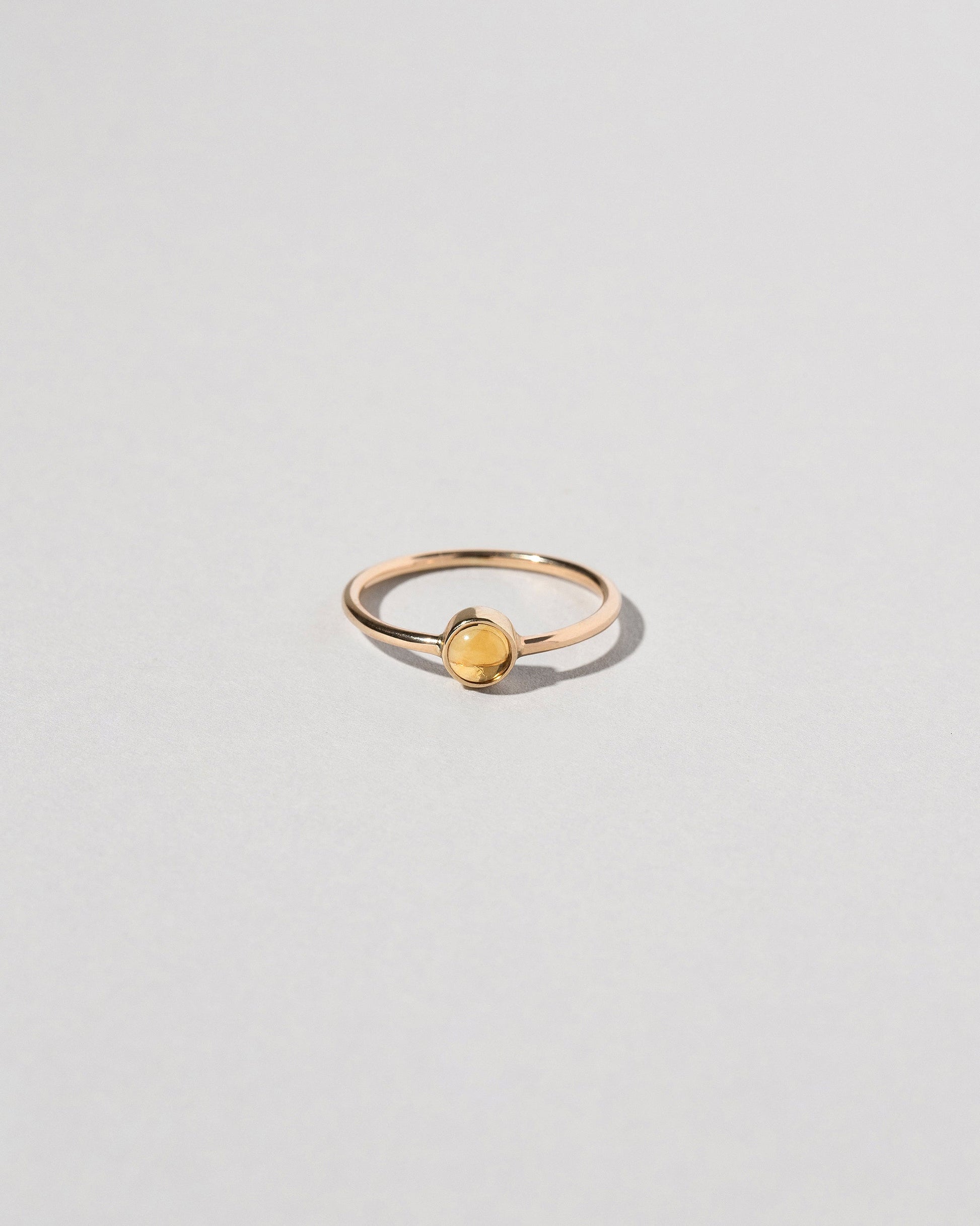 Birthstone Ring on light color background.