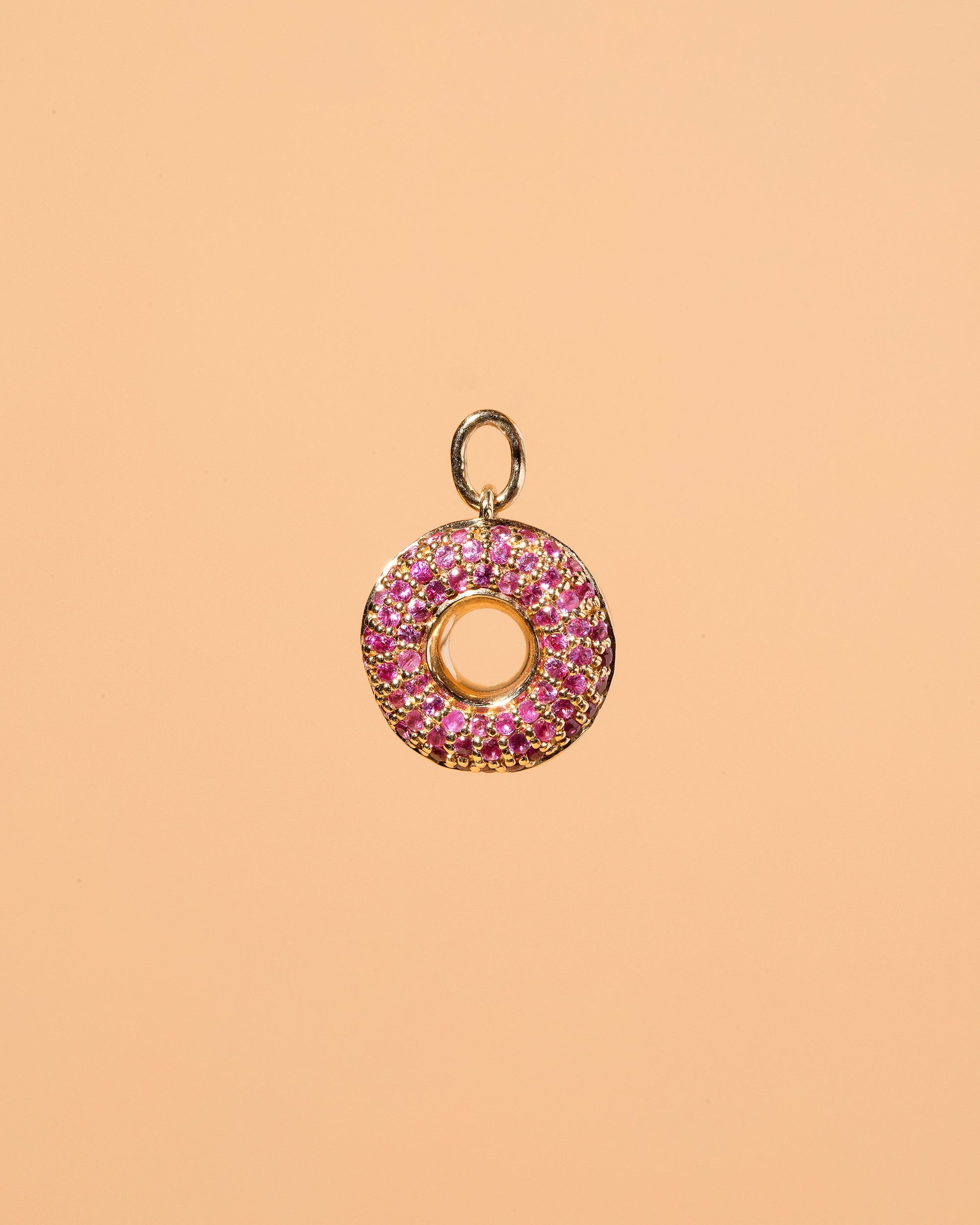 Strawberry Donut Charm on light color background.