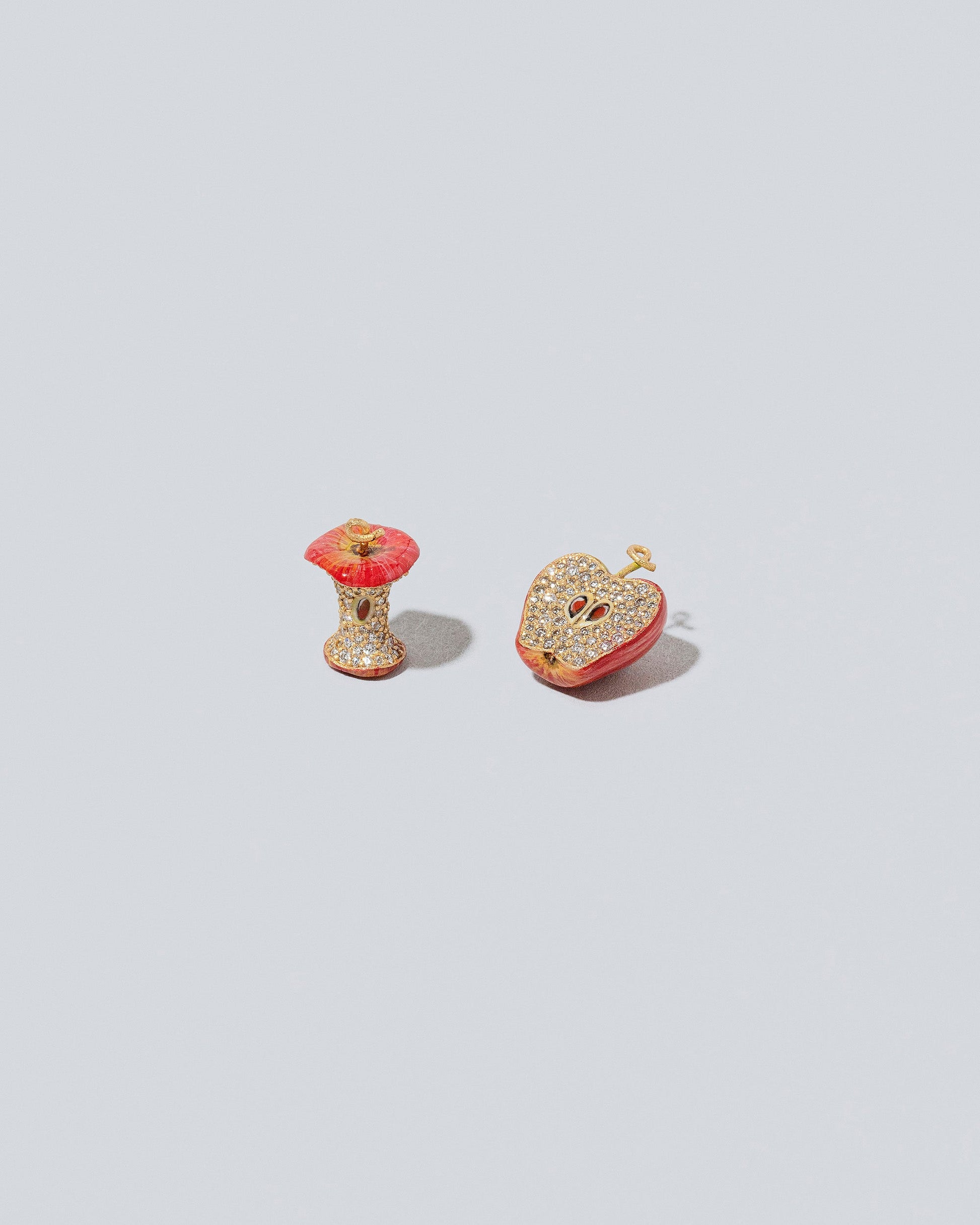 Red Apple Charm - Full and Core on light color background.