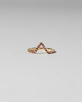 Red Anthill Garnet Pavé Triangle Band on light color background.