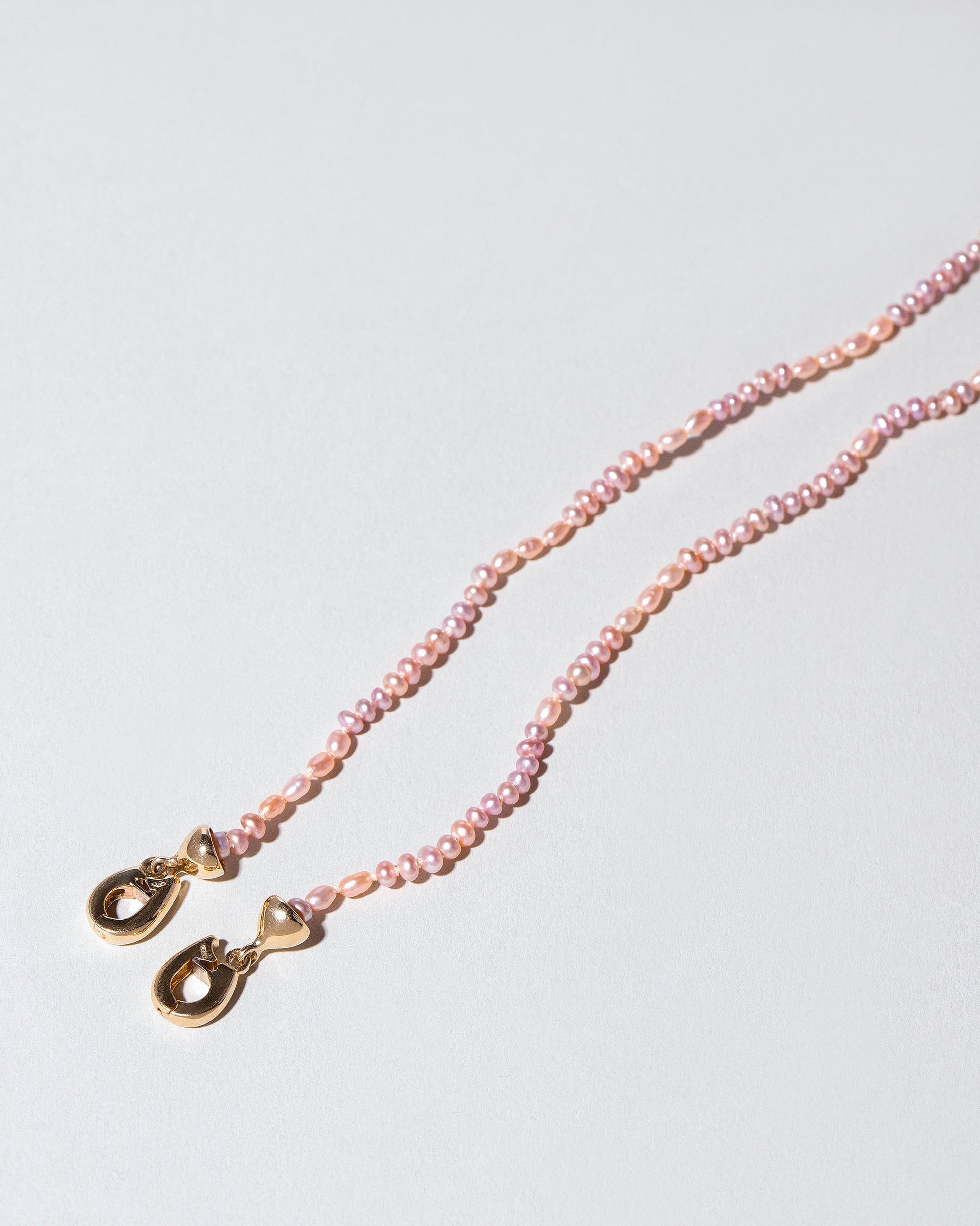 Convertible Optical Chain on light color background.