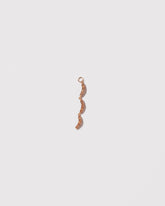 Sausage Links Charm on light color background.