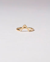 Gold White Diamond Five Stone Triangle Band on light color background.