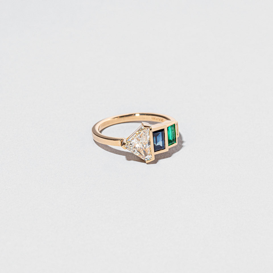 product_details:: Woman House Ring on light color background.