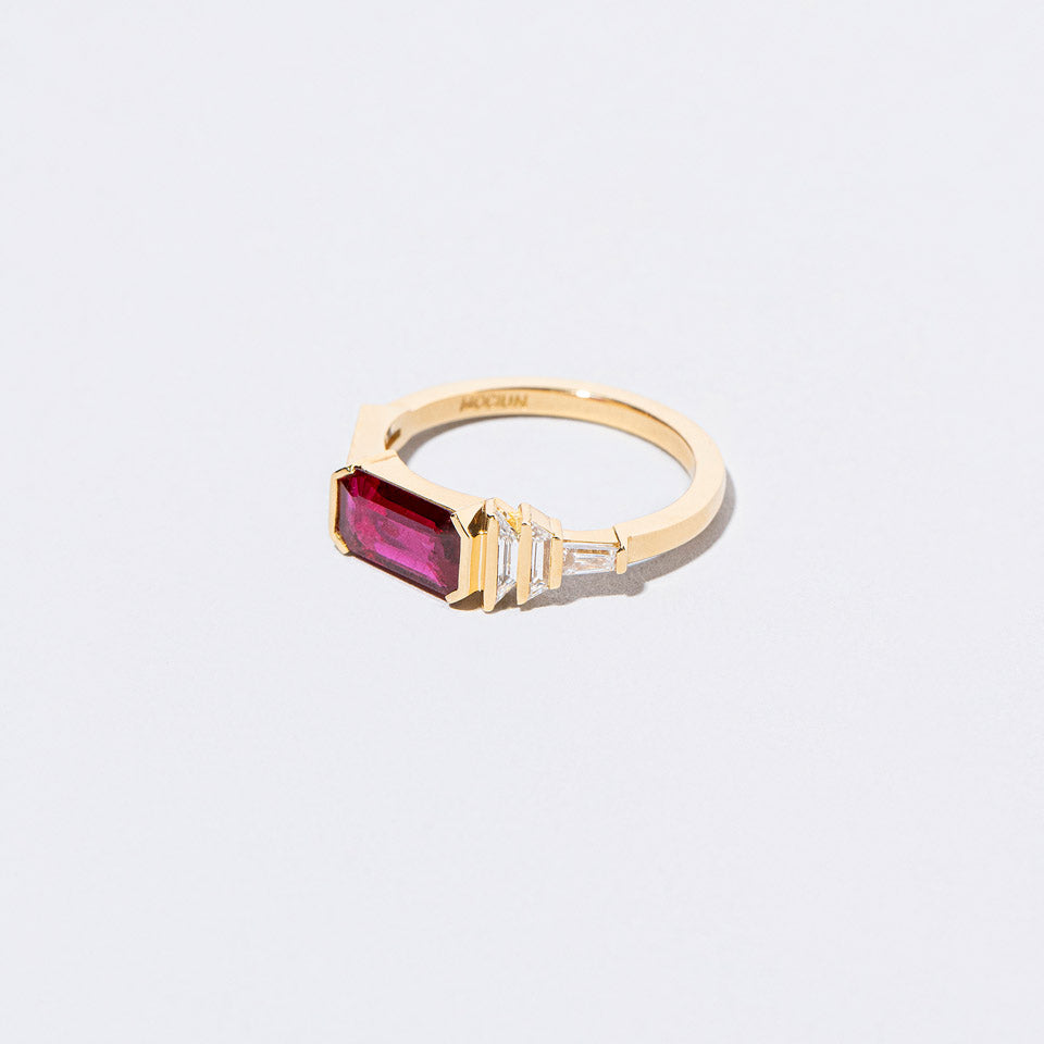 product_details::Closeup details of the Femme Volage Ring on light color background.