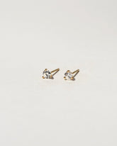 Martini Studs - White Diamond on light color background.
