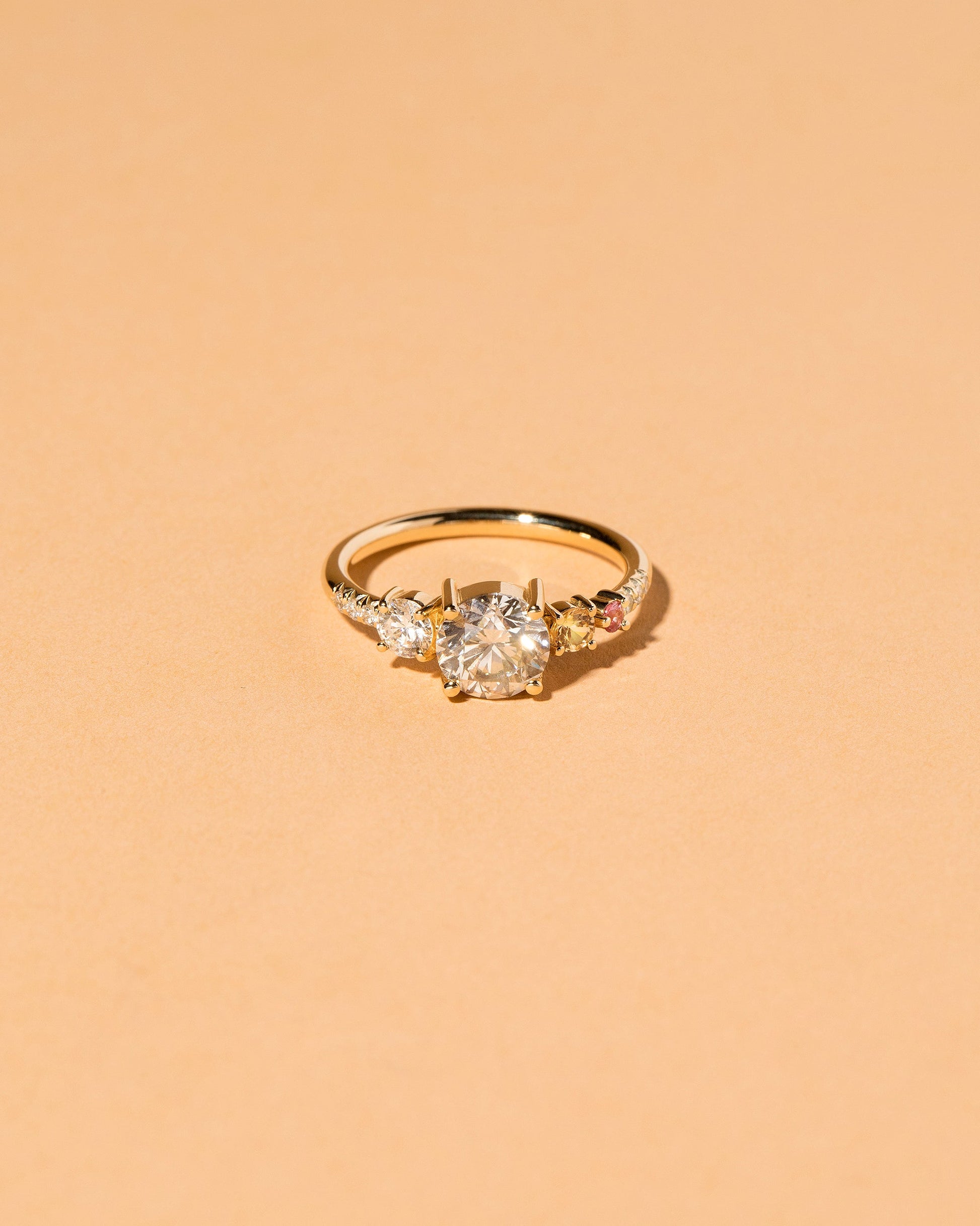 Rhea Ring on light color background.