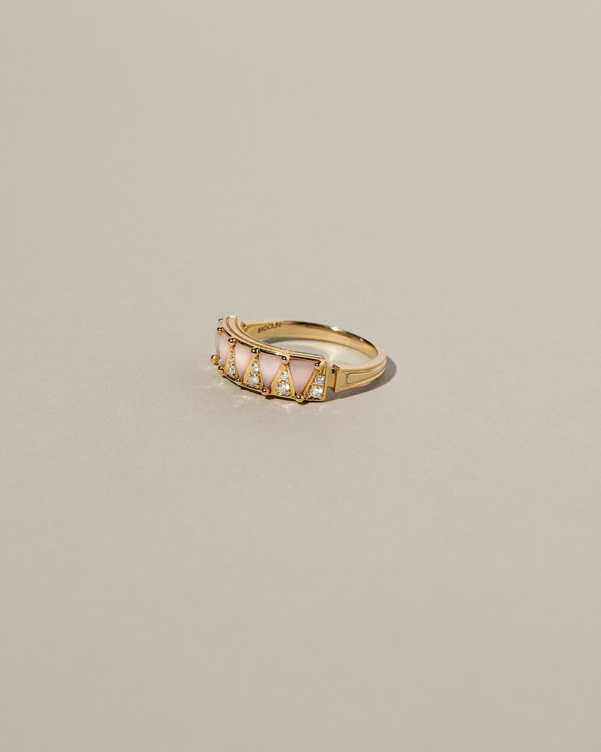  Five Triangle Ring - Pink Opal on light color background.