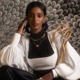 product_details::Styled image of the Infinite Spiral Necklace and Full White Diamond Spiral Necklace.