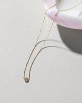 Circle Necklace on light color background.