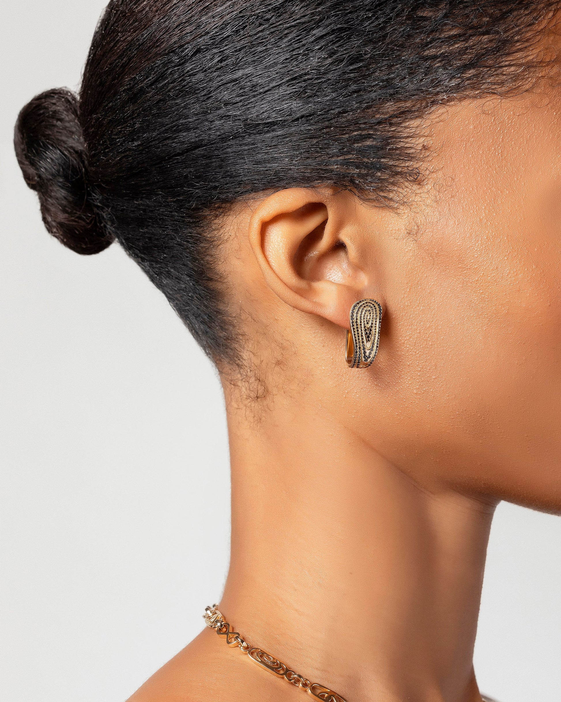 Black Diamond Duality Hoop Earrings on model.