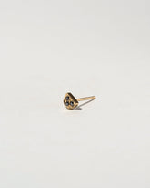 Black Diamond Half Moon Stud Earring Single on light color background.