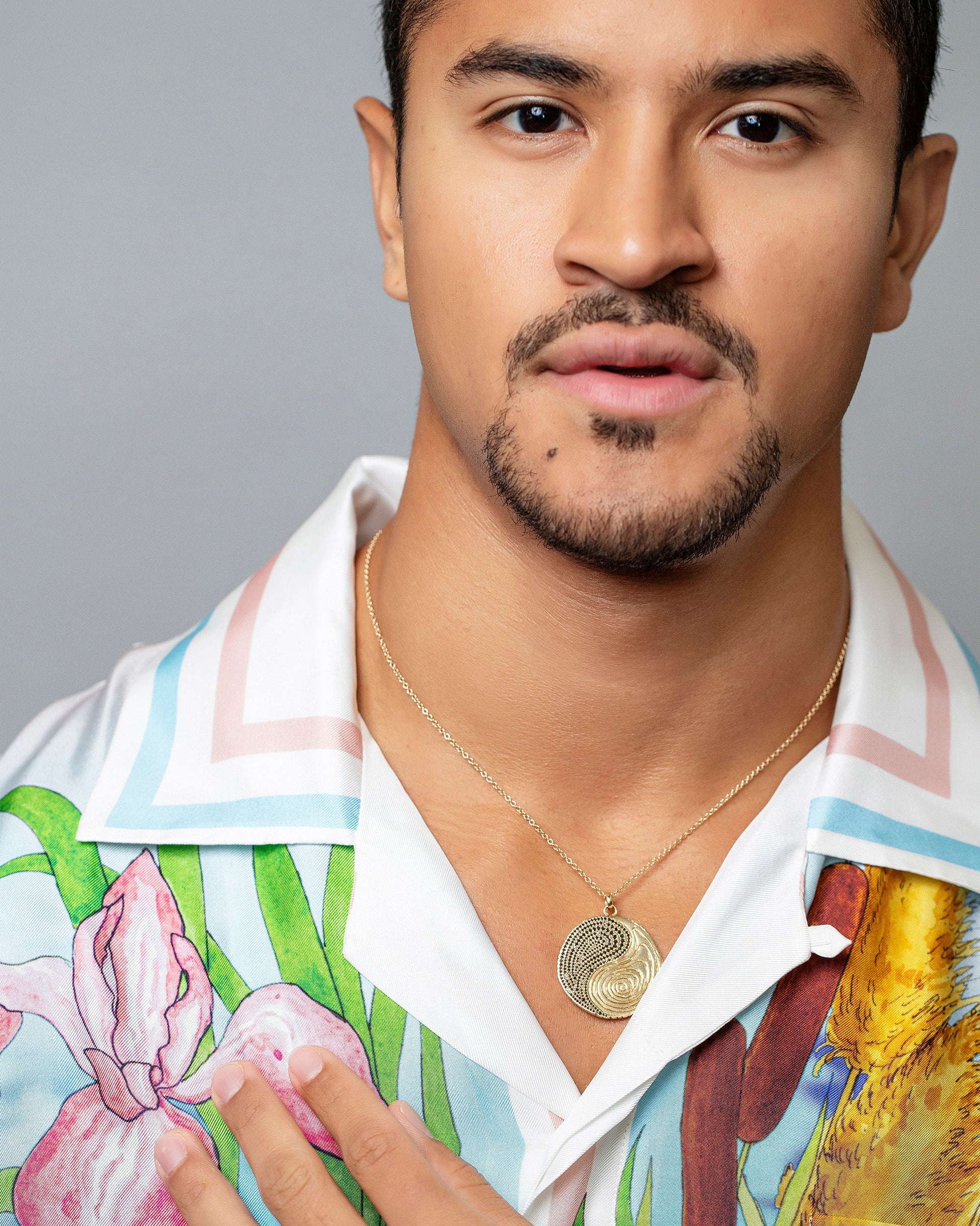 Grand Duality Medallion on model.