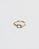 Athelas Ring on light color background.