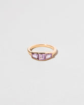 Dhatu Ring on light color background.